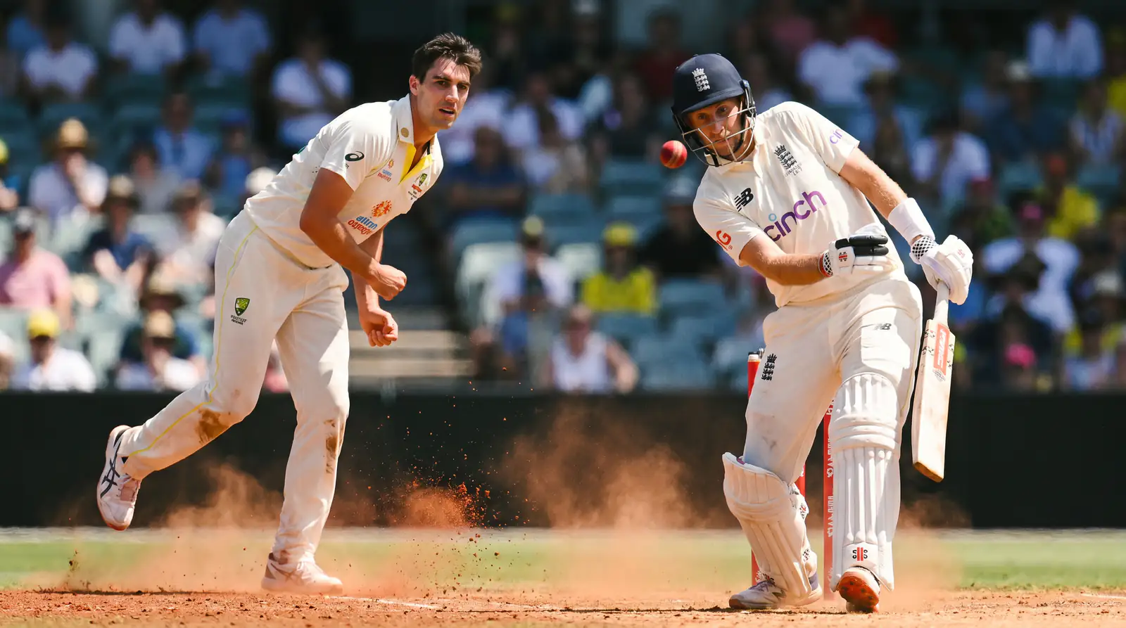 Australian fast bowler generating steep bounce on a hard Perth pitch during an Ashes Test