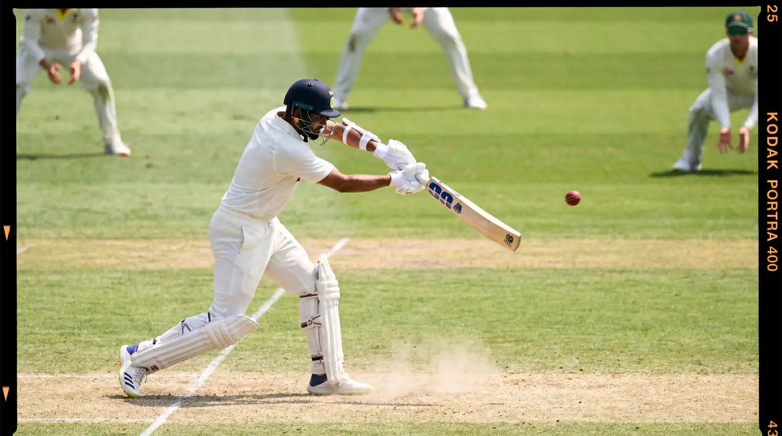 Cricket batsman playing a controlled drive with top batsman betting stats overlaid