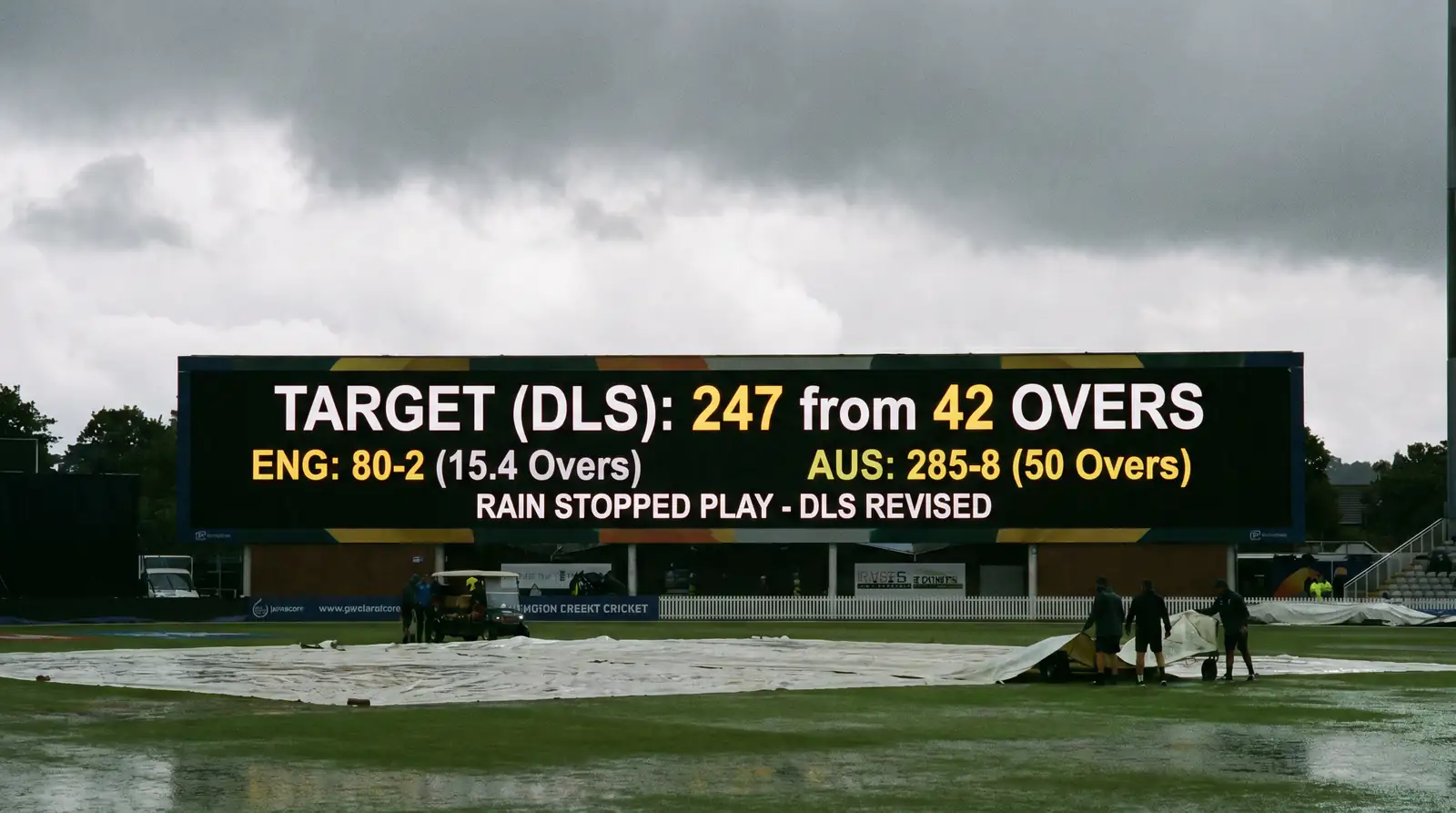 Cricket scoreboard showing a DLS-revised target after a rain interruption during a limited-overs match