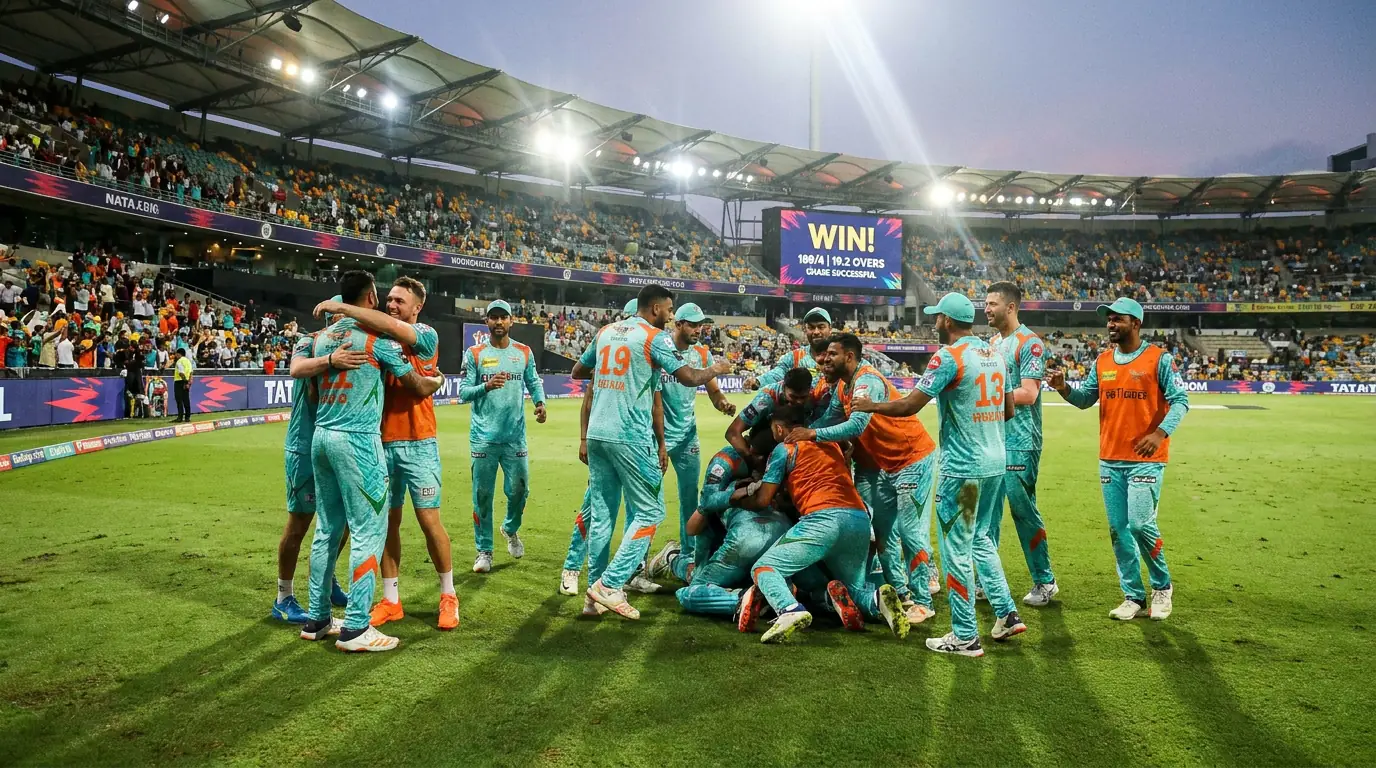 T20 cricket team celebrating a successful run chase under stadium lights