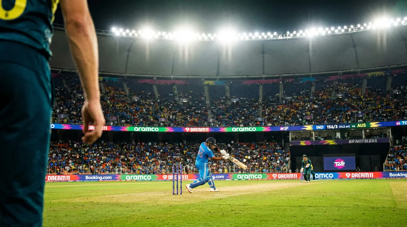 Floodlit T20 cricket match with batsmen scoring runs during a high-intensity powerplay phase